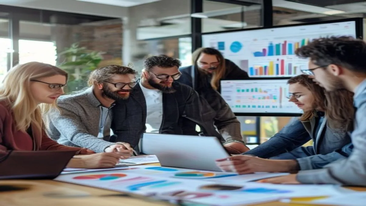 A diverse group of professionals collaborating on a digital marketing strategy, looking at charts and screens, conveying growth and success. Modern office setting with natural light. No visible text, no logos, no watermarks.